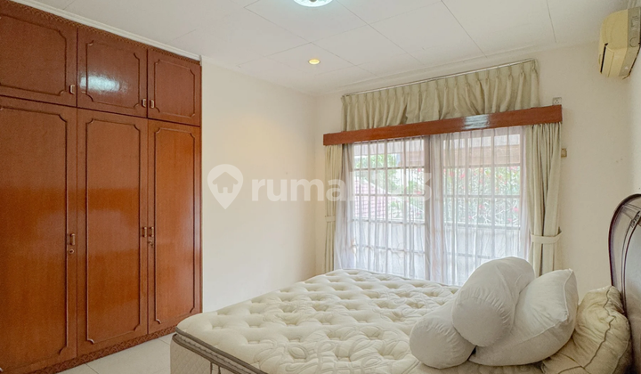FOR RENT!!! Spacious 2-Story Semi-Furnished House in Kemang with Swimming Pool and Garden 2