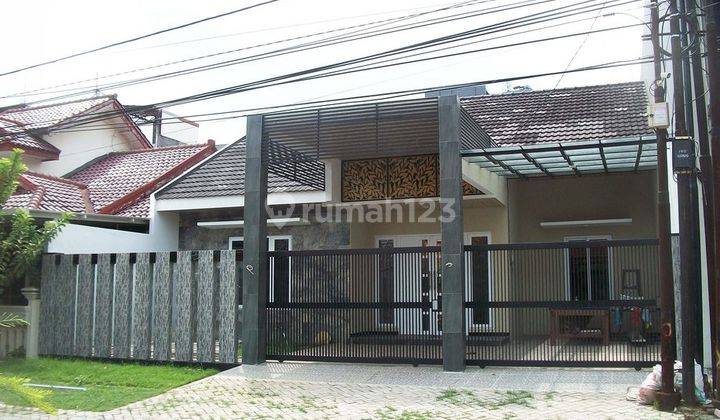 Rumah di Jemursari Surabaya, Lokasi Strategis, Minimalis, Dekat Hotel, Row Jalan 6 meter, ada taman depan & belakang rumah, Siap Huni 1