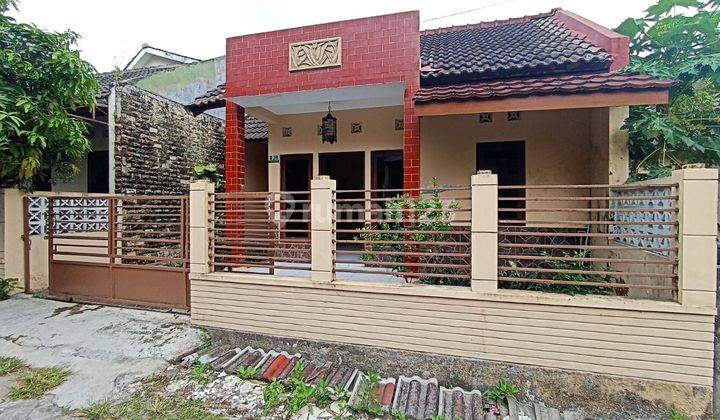 Rumah dalam Perumahan timur Budi Mulia Tajem 1