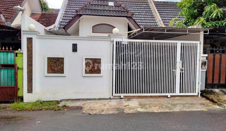 RUMAH TEPI JALAN ASPAL BARAT PATANG PULUHAN 1