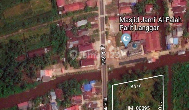 Tanah Tepi Jalan Wajok 9.090m2 2