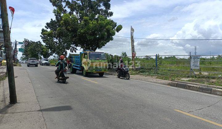 Tanah pinggir jalan raya 8