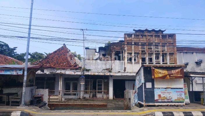 Land and Buildings in the City Center, in Front of a Star Hotel and Business Center.