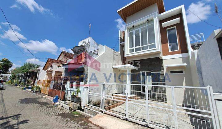 Rumah di Kapi Sraba Sawojajar, Modern Minimalis 3 Kamar 1