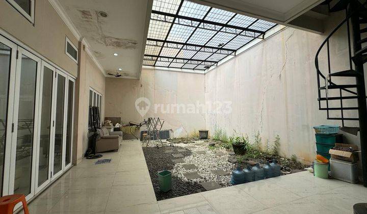 Rumah di Pluit 330m2 Dekat Mall, Area Taman Luas, Hadap Timur Jalan Lebar 2