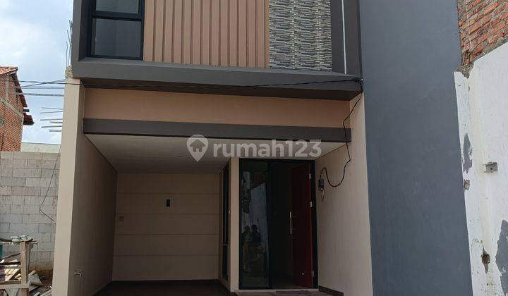 Rumah Cluster Millenio Kebon Jeruk Kelapa Dua Dekat GTO dan Shelter Bus Way 1