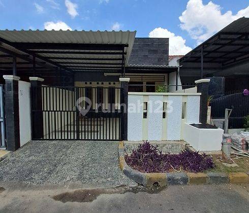 Rumah siap Pakai, Utara,1,5 Lt, non Furnished, diCluster Banjar Wijaya 1