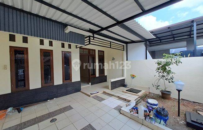 Rumah siap Pakai, Utara,1,5 Lt, non Furnished, diCluster Banjar Wijaya 2