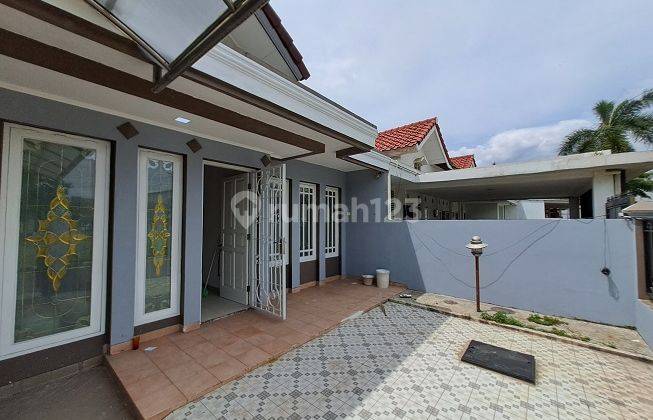 Rumah siap huni, renovasi, Timur, depan taman,di Cluster Banjar Wijaya 2