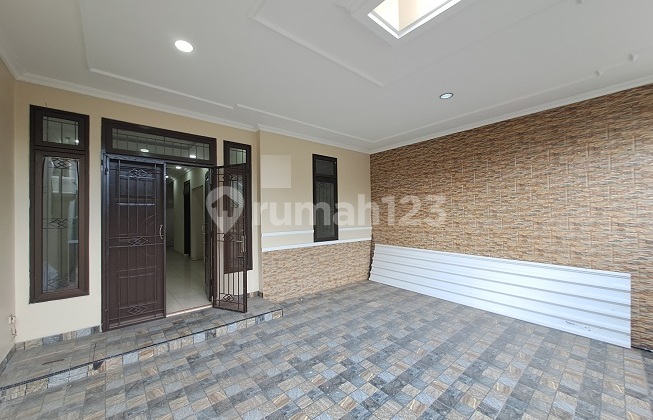 Rumah siap huni, renovasi,full bangunan, 2 LT,di Cluster Banjar Wijaya 2