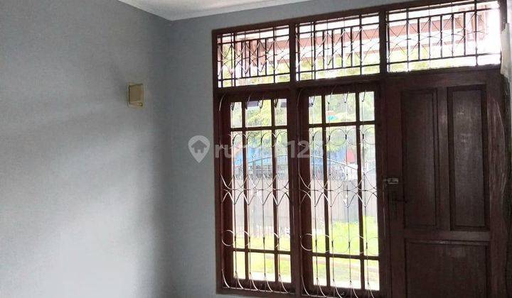 Rumah siap huni, Non furnished, 2 LT, Selatan, Di Perum Banjar Wijaya 2