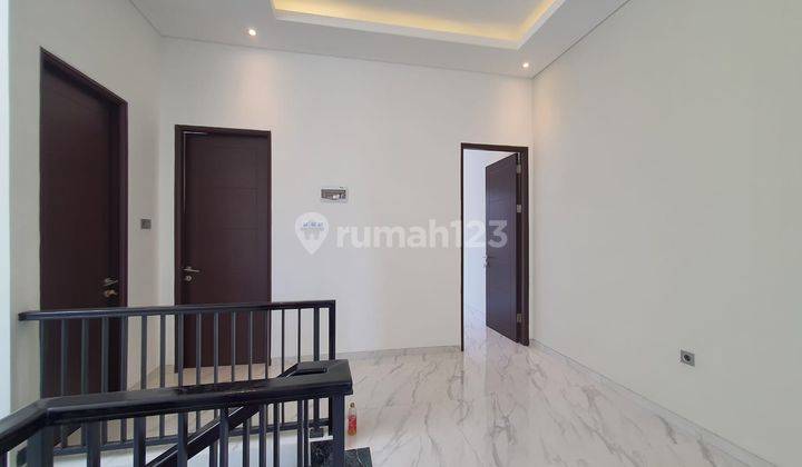 Rumah Kekinian Babatan Pantai 2 Lantai Modern Minimalis Dekat Jalan Utama 7