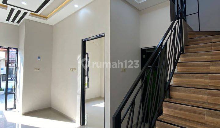 Rumah di Kedinding 2 Lantai Scandinavian Bisa KPR Lokasi Depan 2