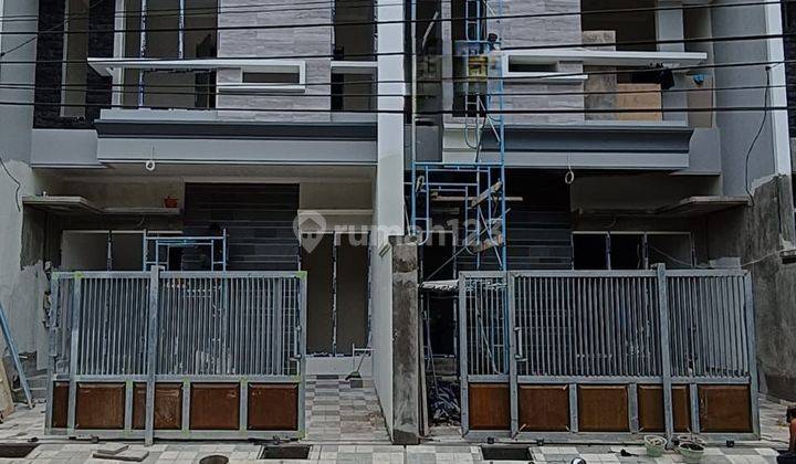 Rumah Nginden Intan Tengah Kota 2 Lantai SHM Row Lebar 1