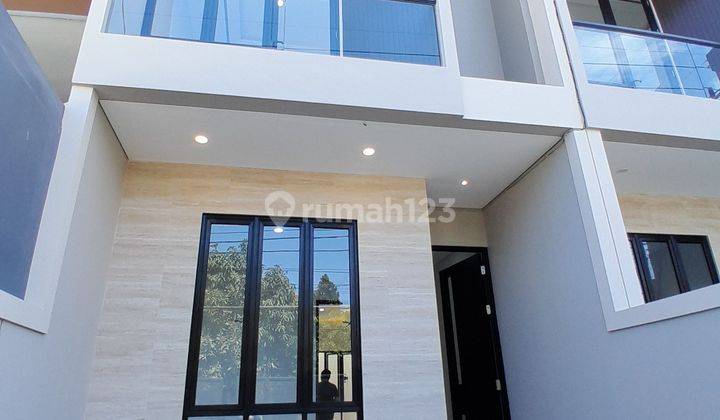 Rumah Mewah Modern Sutorejo Utara 2 Lantai SHM Selatan 1