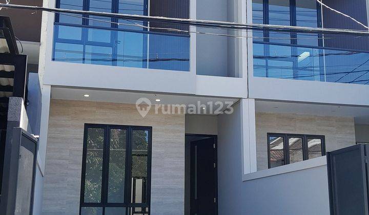 Rumah Mewah Modern Sutorejo Utara 2 Lantai SHM Selatan 2