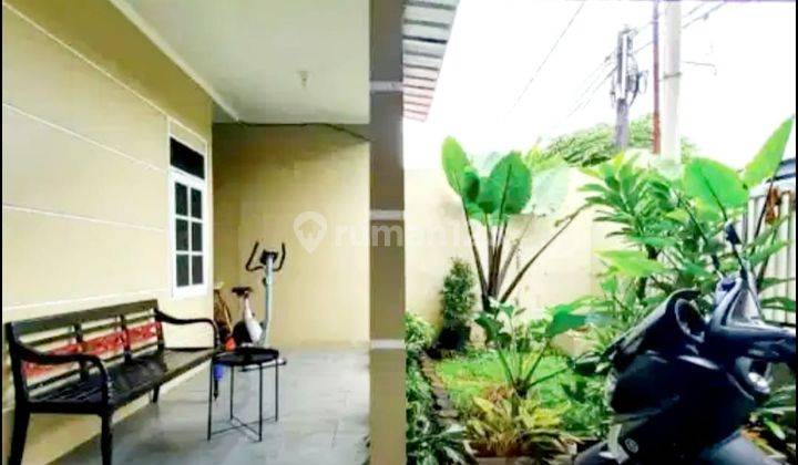 Rumah Taman Depan Belakang Asri di Nusa Loka Bsd 2