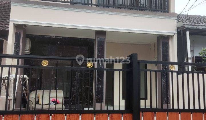 Rumah minimalis modern 2 lantai full renovasi Melati Mas 1