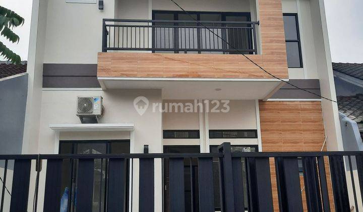 Rumah baru minimalis modern 2 lantai di Melati Mas 1