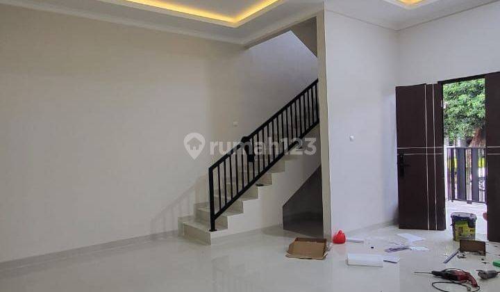 Rumah baru minimalis modern 2 lantai Depan Taman di Melati Mas 2