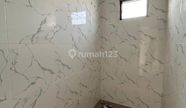 Rumah baru minimalis modern 2 lantai di Melati Mas 2