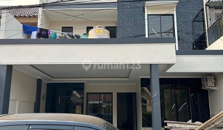 Rumah baru minimalis modern 2 lantai di Melati Mas 1