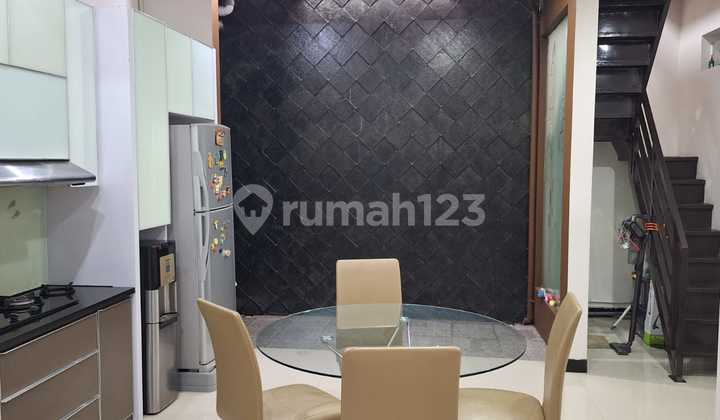 Rumah Semi Furnished di Cluster Sommerville Taman Kopo Indah 2
