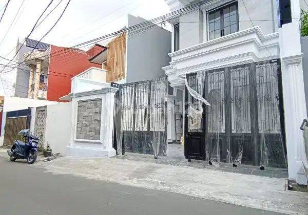 Rumah Di Jl. Sawo Manila Baru Modern Tropis Terbaru  2