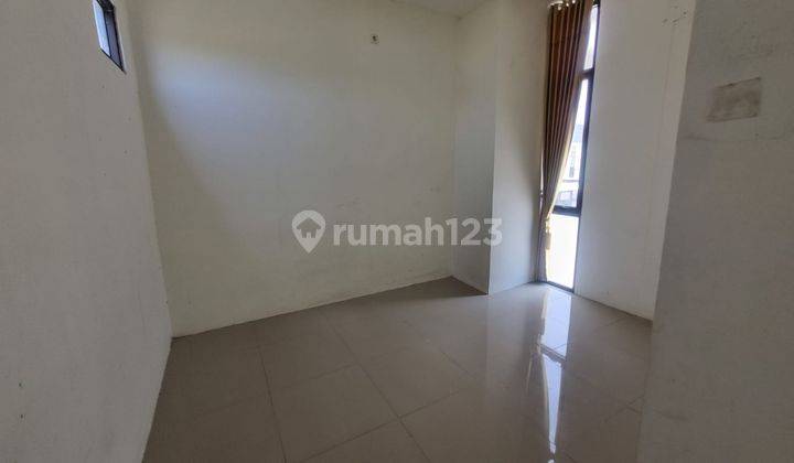 Rumah 2 Lantai Perum Golden East Cluster Alamanda Kebomas Gresik 2