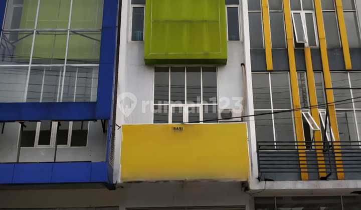 Dr. Wahidin SH Kebomas Gresik 3-Story Town Center Shop House Facing Main Road in Business Area with Rows of Banks, Restaurants, Banks