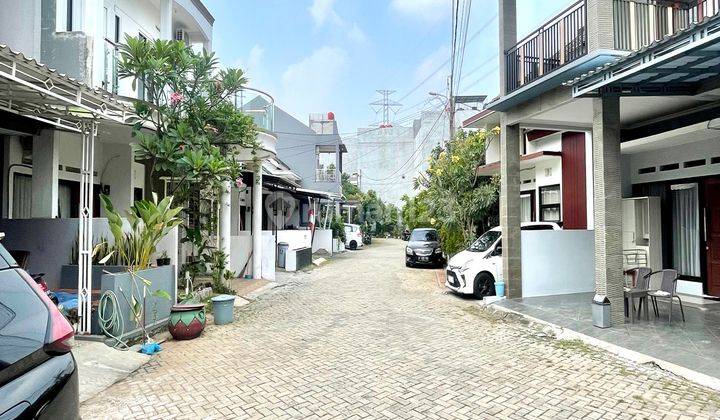 Rumah Dalam Town House Hanya 5 menit ke TOL Sawangan 2