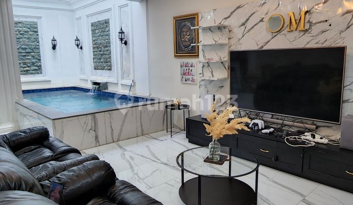 Rumah Cantik Modern 3 Lantai dengan Kolam Renang Indoor di Antapani 2