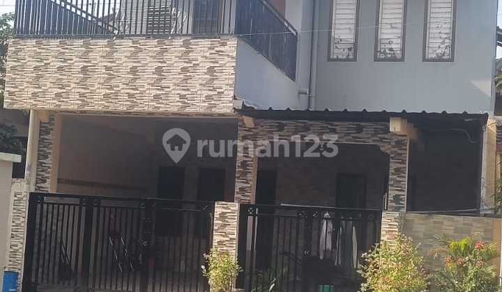 Di jual rmh 2 lantai di taman Titian indah