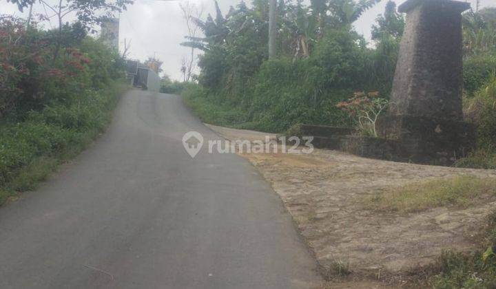 Tanah Dengan View Pegunungan Dan Pantai 1