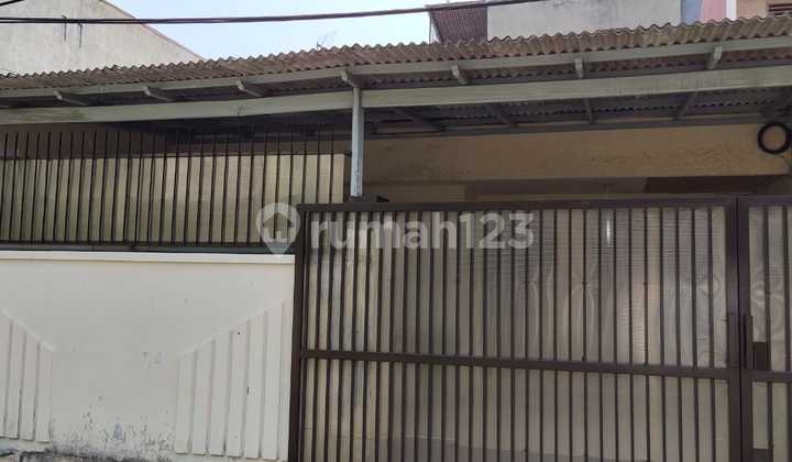 Rumah Dalam Komplek Taman Kota