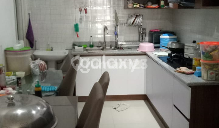 Ready-to-occupy strategic and comfortable 2-story house, green nature, Citra Land Surabaya. 2