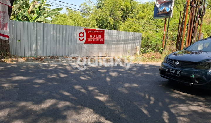 Strategic land location near the highway, ready for any business use.