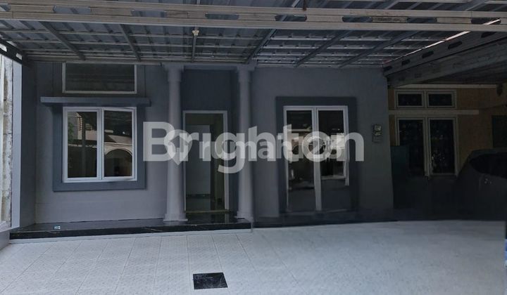 RUMAH DENGAN FASILITAS LENGKAP DI KOTA WISATA 1