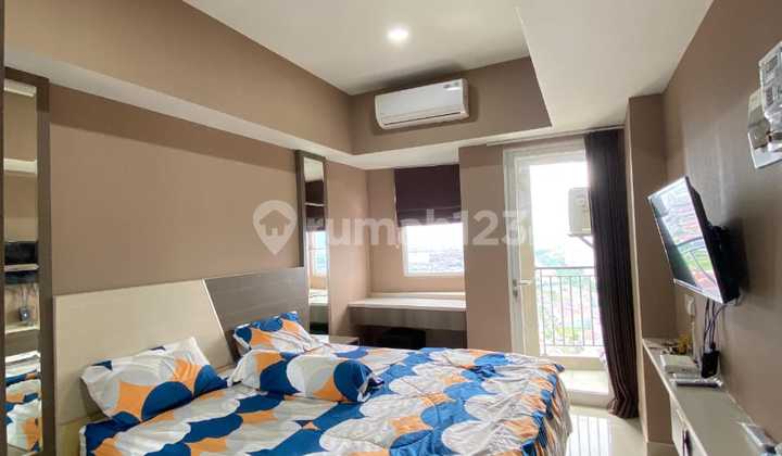 Apartment Unit for Sale 500 Million Already Fully Furnished with Stunning View of Pakuwon City and Suramadu