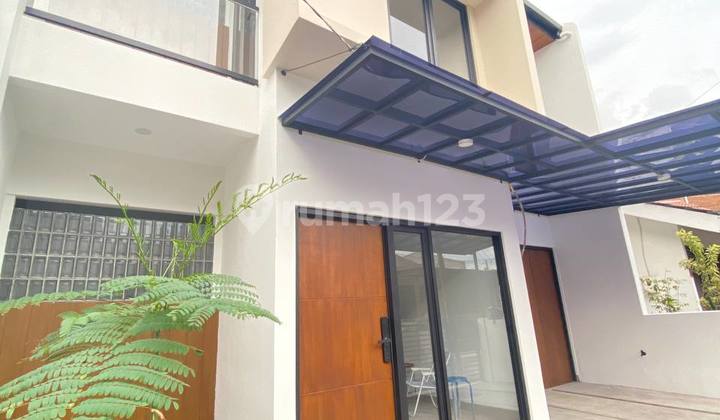 For Sale New Modern Tropical House In Antapani 2 Floors With Open Space Concept