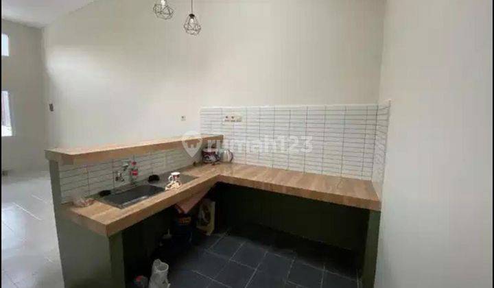 Disewakan Rumah Sudah Renovasi ada Kitchen Set di Graha Raya Bintaro 2