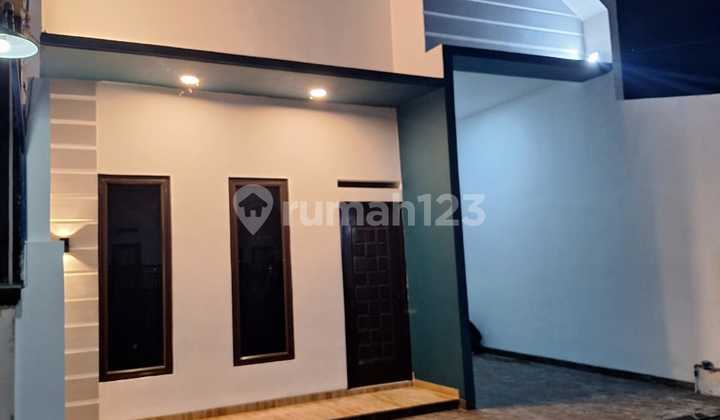 Renovated House in Tytyan Kencana Housing, Bekasi 2