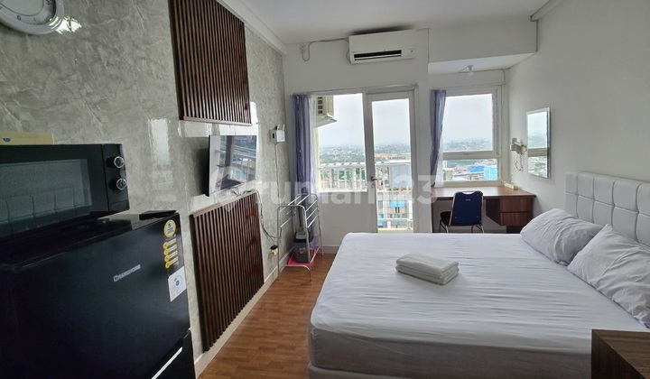 Grand Icon Caman View Studio Apartment on Becakayu Street