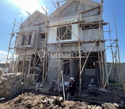 Rumah minimalis Modern Di  Dekat renon di lingkungan Favorit  2