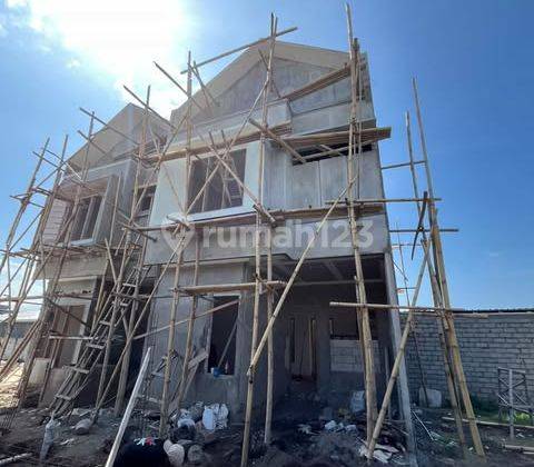 Rumah minimalis Modern Di  Dekat renon di lingkungan Favorit  1