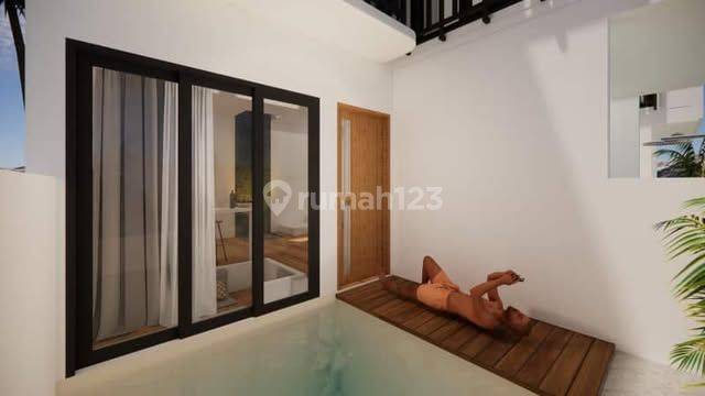 Rumah berkonsep minimalis Modern dengan Kolam renang Pribadi di Denpasar timur 2