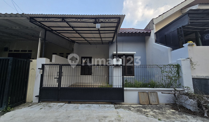 A 1-story house in Nusa Loka 14.5 BSD City, close to Pasar Modern.