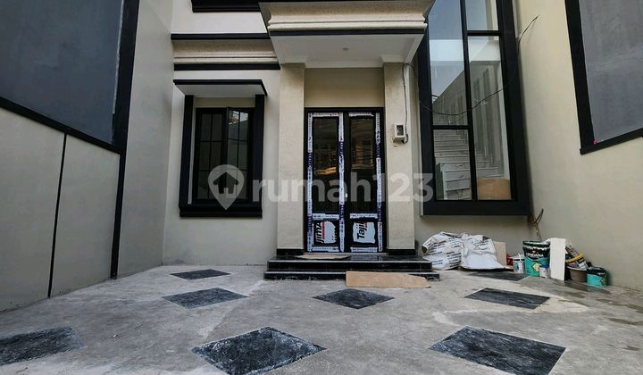 Rumah Taman Ratu American Clasic