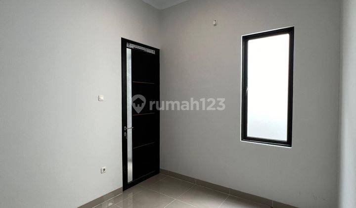 Rumah Minimalis Modern di Kukusan, Depok 2