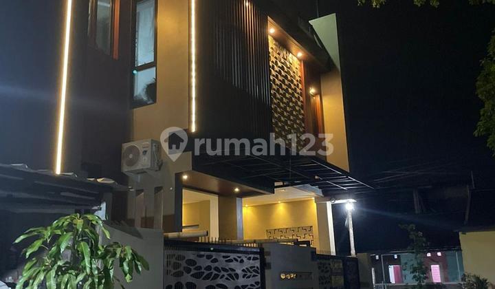 Rumah Baru Bergaya Minimalis Tropikal Modern 2